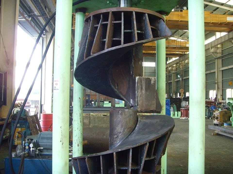 Large-diameter helical auger flight formed in the Auger Bionics UAE workshop